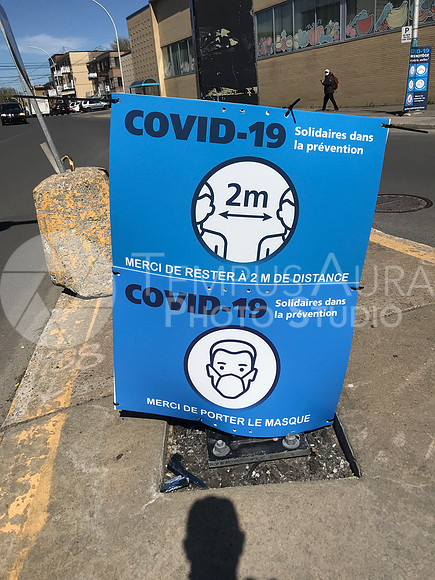 Intersections blocked at eye level by COVID-19 placards. An accident causing danger.